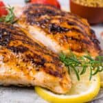Oven baked chicken breast on a plate
